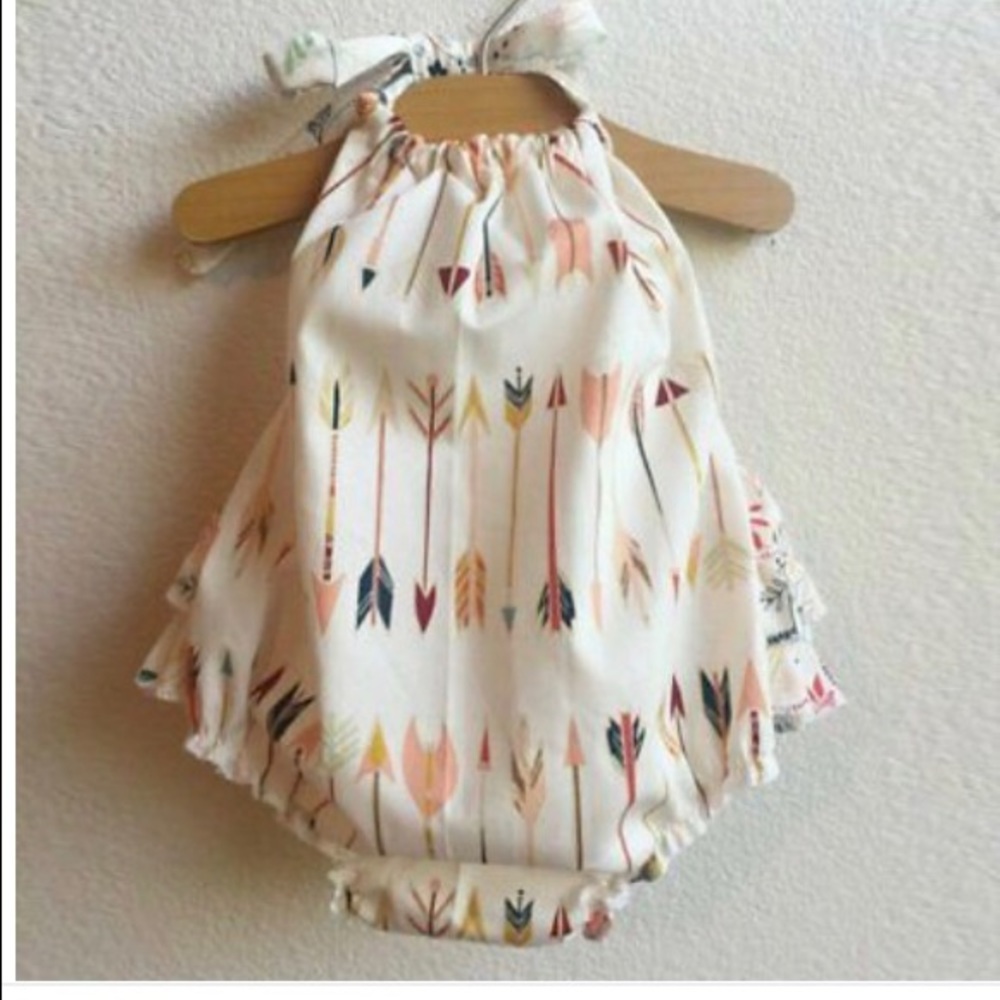 This is a kids romper sun suit.